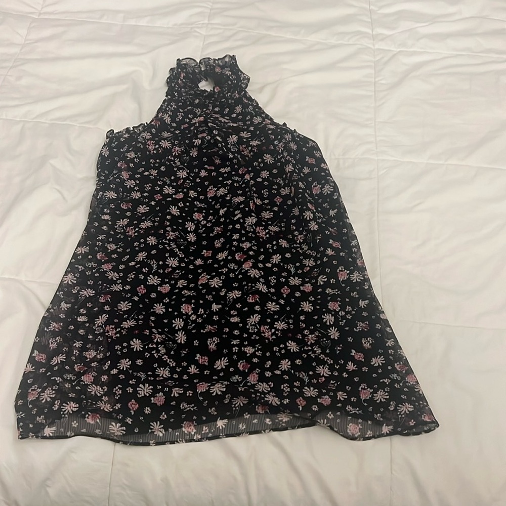 BCBGenerations halter top flowy dress in size xxs.
New with tags